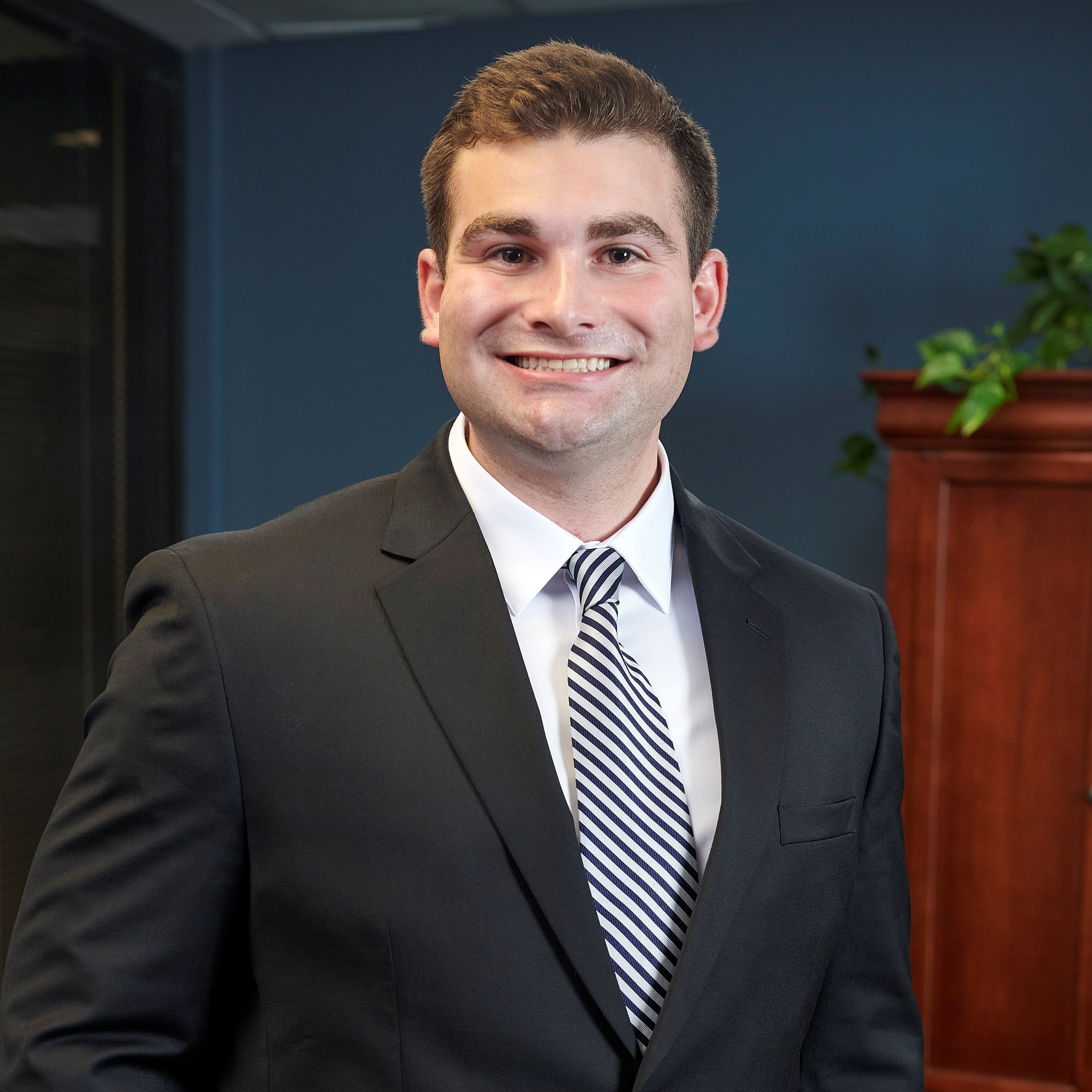 24285_Financial Strategies12577 zach square Junior Associate Financial Planner